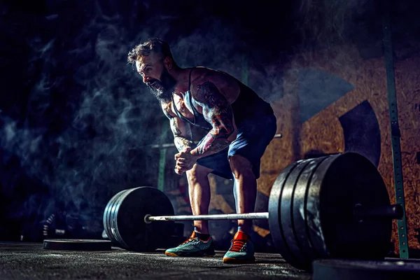 Entrenador de powerlifting